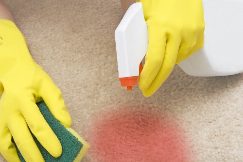 Carpet cleaner preparing equipment before a service appointment