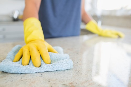 Carpet cleaning team reviewing a service issue and response steps